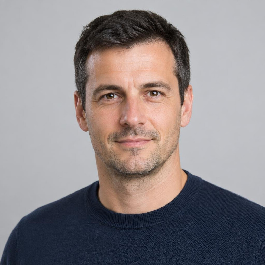 Studio portrait of a man in a sweater